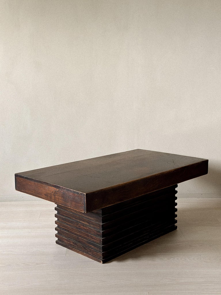 Front view of vintage Spanish coffee table with slatted base