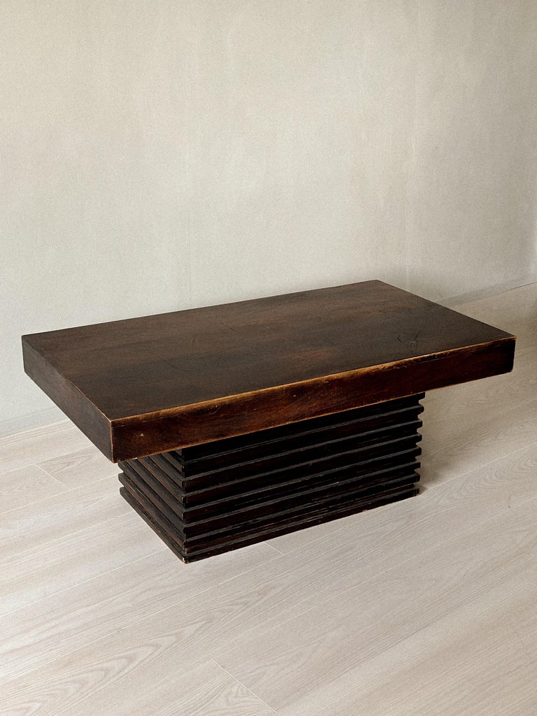 Stacked base coffee table with rustic patina