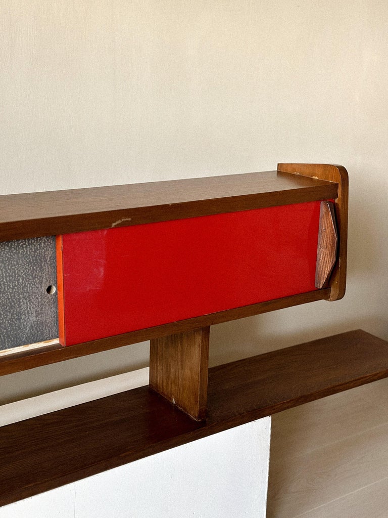 Vintage Perriand-style wall shelf with patinated surfaces