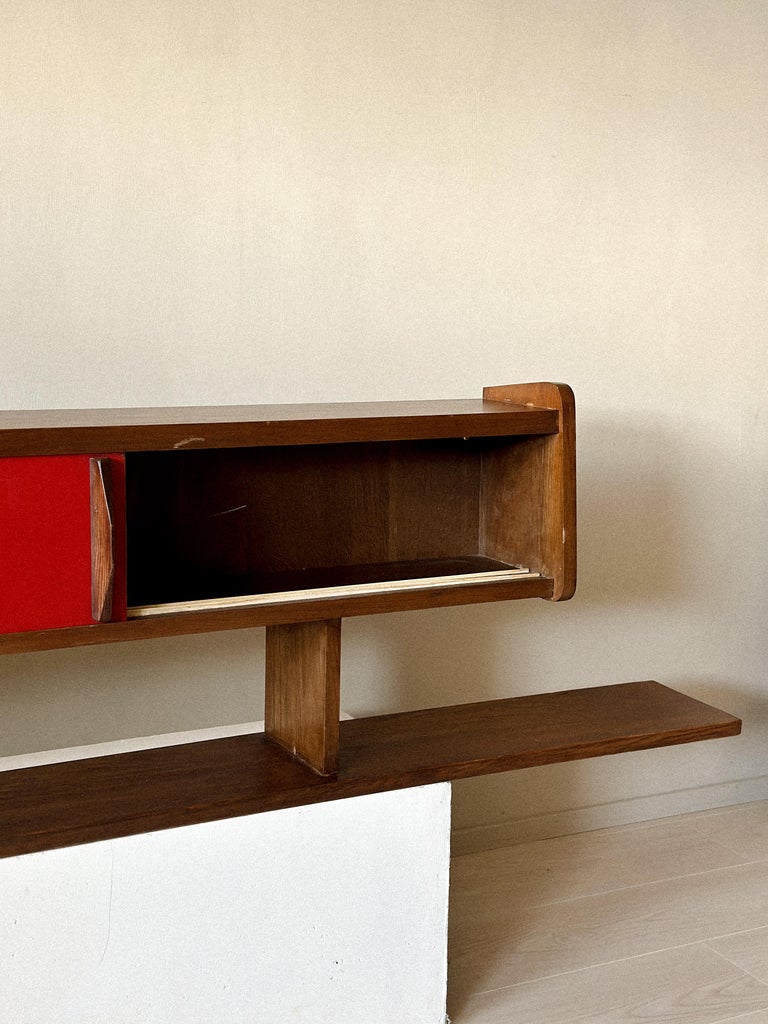 Compact French wall shelf with utilitarian storage