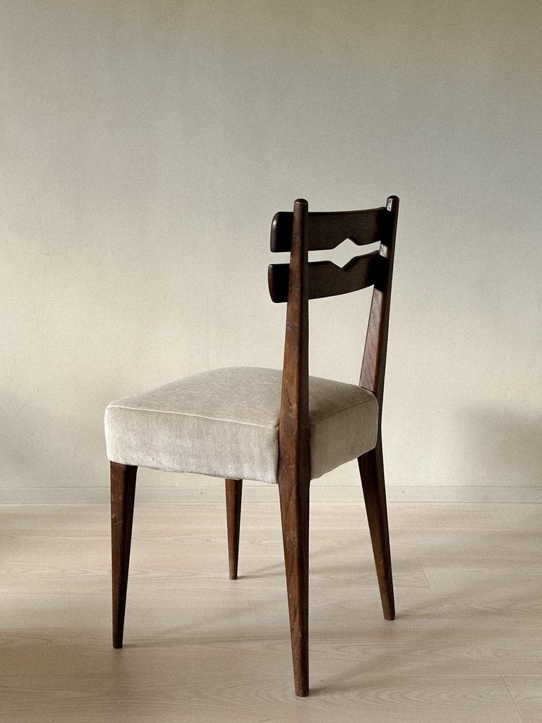 Vintage dining chairs with understated mid-century design
