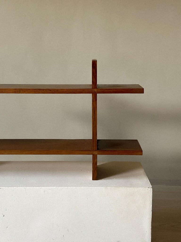 Compact oak wall shelf with simple form, France