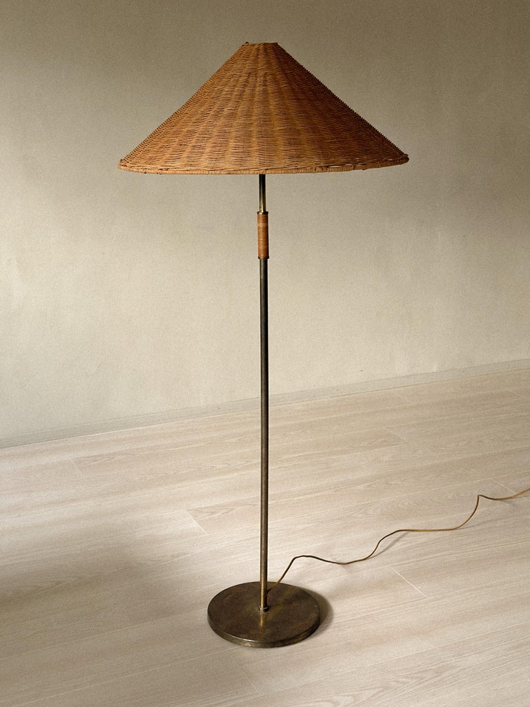 A Mid-Century Floor Lamp in Style of Paavo Tynell, Brass and Rattan, c. 1950s - Image 7