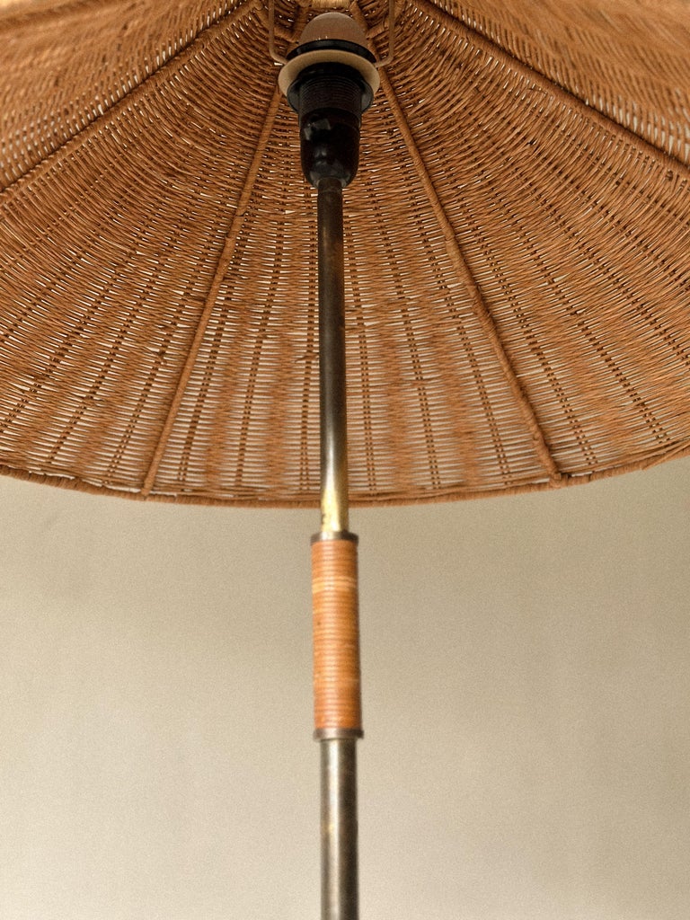 A Mid-Century Floor Lamp in Style of Paavo Tynell, Brass and Rattan, c. 1950s - Image 6