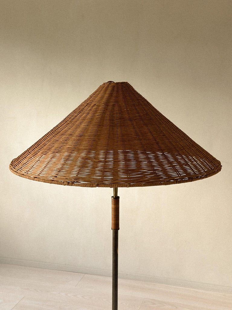 A Mid-Century Floor Lamp in Style of Paavo Tynell, Brass and Rattan, c. 1950s - Image 2
